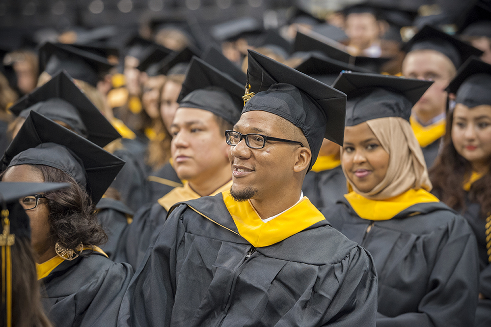 Students sit at a VCU commencement ceremony