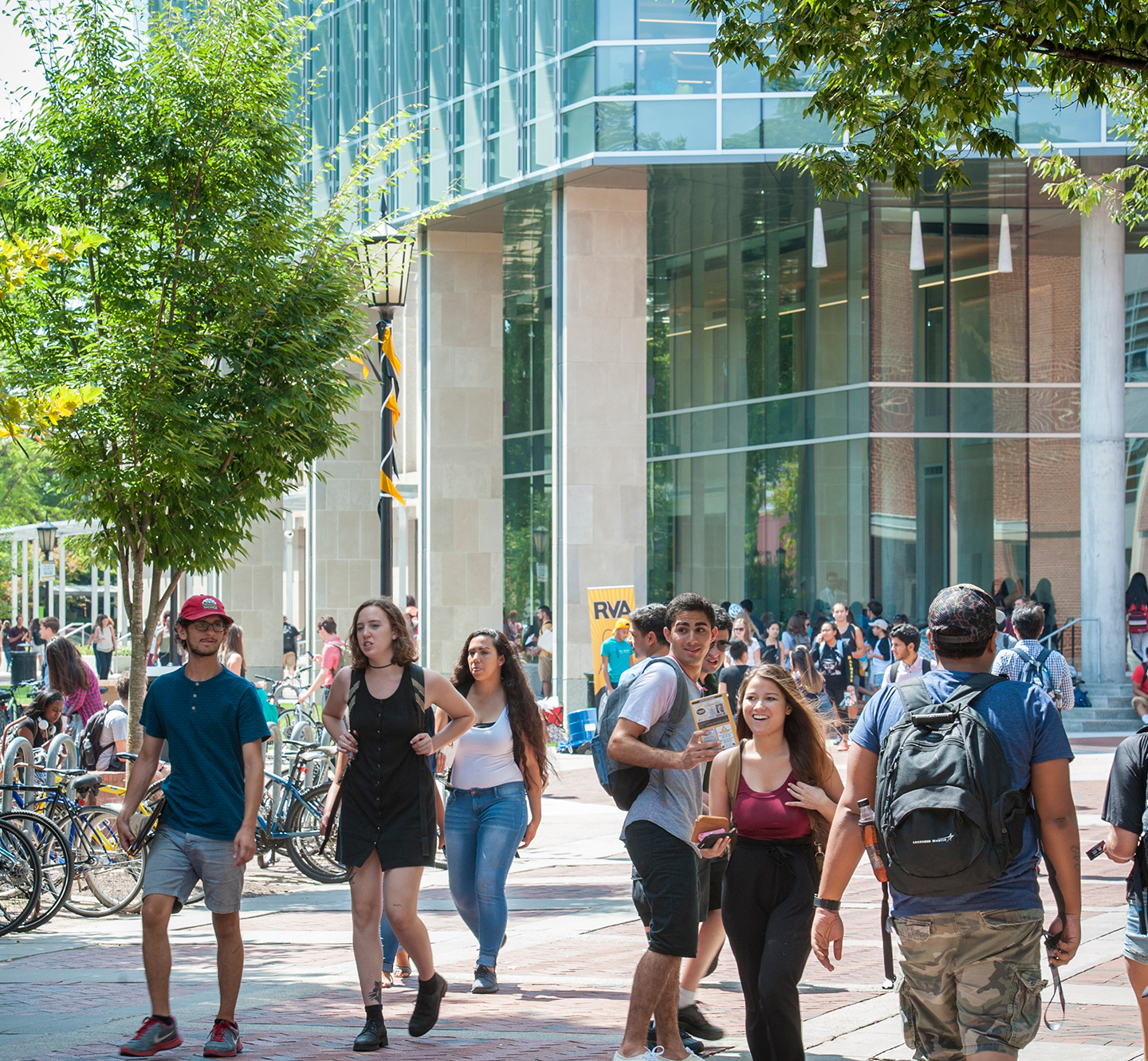 Students walk through VCU's Compass area.